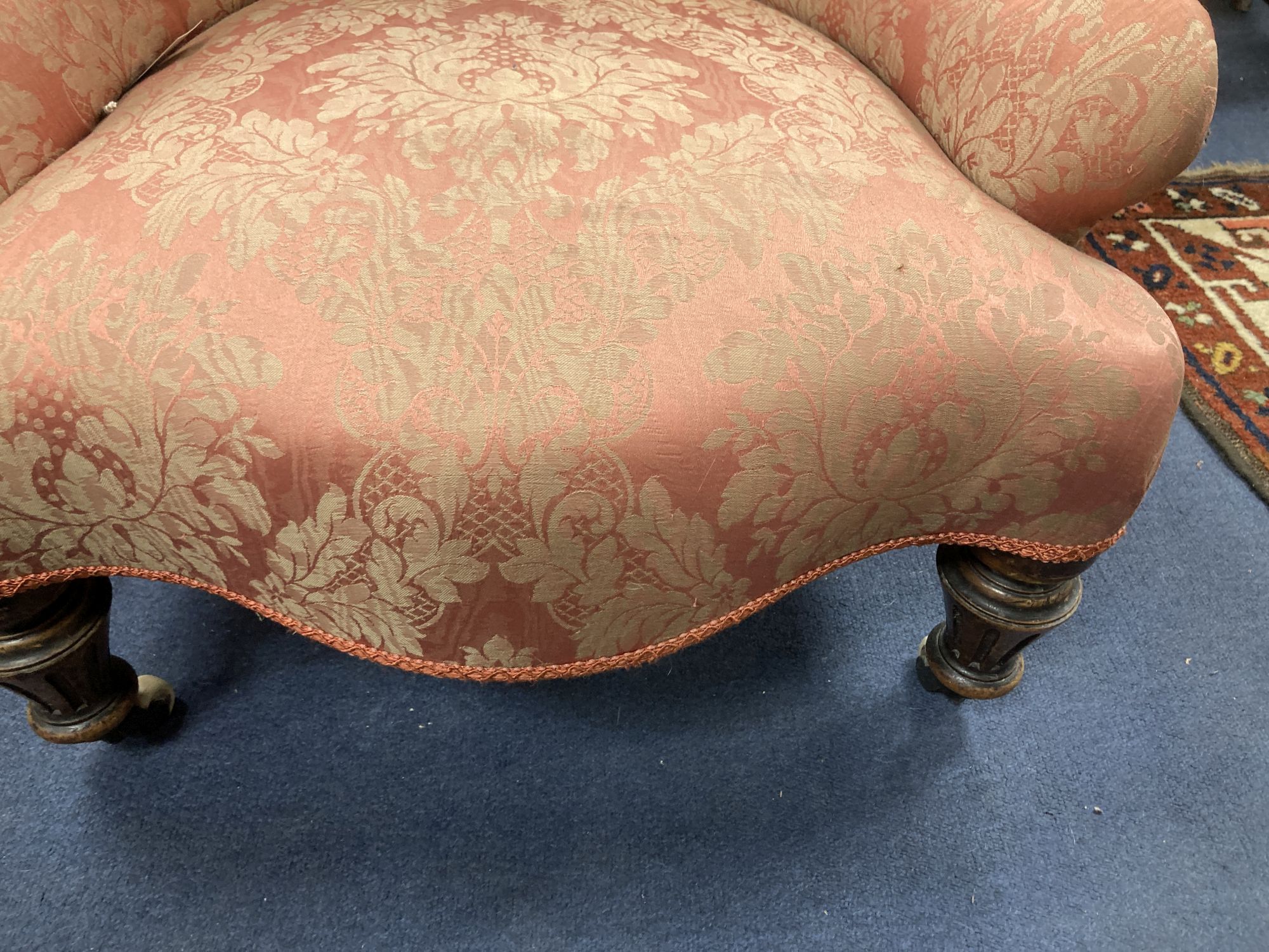 A Victorian button back nursing chair, with pink brocade upholstery, width 65cm, depth 55cm, height 85cm